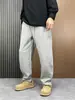 Marca de moda americana Pantalones de chándal versátiles Pantalones largos de otoño e invierno Sueltos Rectos Casuales Pantalones de hombre Estilo perezoso de hombre Pantalones largos versátiles