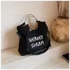 Otoño 2026 Nuevo Bolso de Gran Capacidad para Estudiantes y Viajes Diarios Bolso Tote Portátil para Mujer Bolso de Hombro con Bordado de Letras Bolso Cruzado