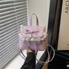 Mochila Nova Moda Primavera 2026 Mochila Casual Texturizada Personalidade Simples Bolinhas Femininas Bolsa de Viagem Fresca