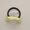 Personalidad de nicho protección del medio ambiente aleación cóncavo-convexo elástico anillo para el pelo todo lo combina viento frío geométrico cuerda para el pelo retro temperamento cuerda para la cabeza mujeres
