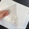 Película Láser Holográfica Mixta Autoadhesiva A4 Película de Laminación en Frío Película Láser Colorida Copo de Nieve Corazón Estrella Molino de Viento Estándar Americano