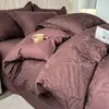 Conjunto de quatro peças de algodão escovado jacquard em relevo tecido espesso de alta qualidade com capa de edredom de borda larga, lençol de cima, lençol com elástico, conjunto de três peças de algodão puro espessado