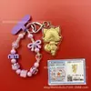 Llavero de tela con logo de empresa personalizado Cadena para teléfono móvil Angela Lámina de oro puro Oro 999 Regalo de aniversario