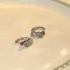 Pendientes de circonita coloridos pequeños y exquisitos pendientes simples 2025 nuevos pendientes estilo extranjero ins pendientes para mujer sentido de alta gama