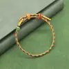 Producto premium hecho a manoCuerda de cinco colores del Festival del Bote del DragónPulsera de nudo plano ajustable para bebés, niños y adultos