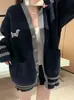 Chamarra suéter estilo universitario coreano 2026 otoño e invierno talla grande holgada casual nueva cardigan de punto con cuello en V