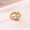 Explosiones de Amazon anillo de color circón asimétrico clásico exquisito incrustación anillo de circón coreano venta al por mayor