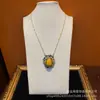 Bronze Antigo Ocidental Banhado a Ouro 18K Retro Dourado com Pedra Natural Amarela como Pedra Principal e Strass Multicoloridos