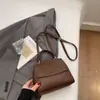 Bolso Pequeño Serie Niu para Mujer Estilo Nuevo 2025 Nicho Retro Casual Moda Versátil Bolso de Hombro Cruzado
