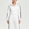 Conjunto deportivo casual transfronterizo para mujer, nuevo estilo otoño e invierno, conjunto de dos piezas con chaqueta de fitness de manga larga y pantalones rectos holgados que estilizan.