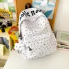 Mochila Escolar Simples de Grande Capacidade para Mulheres 2026 Novo Estilo Ins Mochila de Alto Valor Estilo Japonês Leve Mochila Estudantil Estampada
