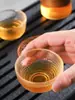 Xícara de chá pequena de vidro resistente ao calor, xícara de chá transparente de cristal estilo japonês espessada para uso doméstico, xícara para degustação de chá com padrão martelado, conjunto de chá kung fu pessoal