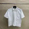 Tb Directo de Fábrica Verano Nuevo Arena Burbuja Solapa Manga Corta Hombres y Mujeres Color Puro Delgado Moda Polo Manga Corta