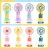 2024 Ventilador Mini Portátil de Mano Carga USB Mini Ventilador Eléctrico de Dibujos Animados Ventilador de Promoción Publicitaria Fabricante Venta al por Mayor