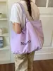 Bolsa de Lona con Estampado de Letras para Viajes Transfronterizos para Mujer 2026 Nueva Moda Gran Capacidad Versátil Ligera Bolso de Hombro