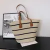 Nueva Bolsa de Paja Tejida 2026 Playa Costa Vacaciones Gran Capacidad Versátil Bolso de Mano para Viajes Cotidianos Tejido de Hombro Único