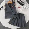 Comércio Exterior Meninas Bebê Roupas Infantis Verão Novo Conjunto Pequeno Colete com Pingente de Cereja + Saia Plissada Estilo Escolar Fábrica de Origem