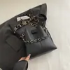 Bolsa de Mão Pequena da Moda para Mulheres 2025 Nova Bolsa de Balde com Corrente de Alto Padrão Design de Nicho Bolsa Transversal Luxo Acessível