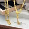 Joias Folheadas a Ouro Estilo Loja de Ouro com Borlas Finamente Trabalhadas em Formato de Flores e Sementes, Joias de Luxo Versáteis para Atacado