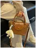 Bolsa Pequena Retrô Outono e Inverno Feminina 2026 Novo Estilo Moda Versátil Bolsa Transversal Bolsa de Mão para o Trabalho Venda Quente Bolsa Bolinho