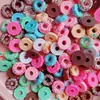 Letras de colores serie de donas rayadas accesorios de resina carcasa de teléfono móvil pasador pegamento de crema accesorios para carcasa de teléfono móvil
