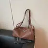 Bolsa de Ombro Feminina Elegante e Simples para o Dia a Dia, Nova Bolsa de Caneta de Nicho Verão 2025, Bolsa de Ombro de Couro de Alto Valor