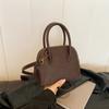 Bolsas de Mujer de Alta Gama Transfronterizas de Nicho Otoño/Invierno 2026 Nuevo Bolso Cruzado de Moda Vintage Popular Bolso de Mano Pequeño con Forma de Concha