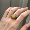 Chiba Taiyin Estilo Chino Nuevo Étnico Ámbar Superficie de Huevo Patrón de Pergamino Anillo Diseño Nicho Anillo Retro Estilo Nacional