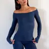 A nova camiseta de manga longa de um ombro da DFYNE absorve a umidade, é altamente elástica, de secagem rápida e adequada para corrida ao ar livre, fitness e yoga.