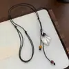 Nuevo collar de hoja de metal de resina cerámica estilo chino para mujer, nuevo modelo 2026, cadena larga versátil estilo étnico para suéter