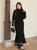 Ropa Tallas Grandes para Mujer Runqi busca nuevos suéteres 9615 cuello alto suave cintura plisada manga murciélago