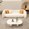 Sofá estilo crema nórdico para salas de estar pequeñas, sofá curvo de lujo ligero, sofá de forma especial para salón de belleza, popular estilo wabi-sabi
