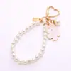 Pulsera de Cadena con Perlas de Flor de Cerezo Bicolor Estilo Coreano Ins Colgante para Teléfono Bolso Versátil de Moda Accesorio