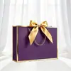 Empaque Lazo de Regalo Personalizado Bolsa de Papel de Mano Bolsa de Compras Lista para Usar Exportación Transfronteriza Impresión de Logotipo Fabricante Envío Gratis