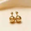 Pendientes Redondos Lisos Minimalistas Retro Populares, Diseño de Nicho con un Toque de Alta Gama, Accesorios para Orejas de Estilo Minimalista de Lujo Ligero Únicos