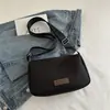 Outono 2026 Nova Bolsa de Lona da Moda Tendência Bolsa Transversal Feminina Bolsa de Ombro Leve Bolsa de Cor Sólida