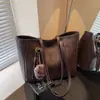 Bolsa de Ombro Versátil Grande Capacidade Estilo Retrô para Mulheres 2023 Nova Cor Lisa Casual Simples de Alta Qualidade