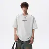 2026 Verano Bordado de Letras Diseño Casual Manga Corta Unisex Blanco Holgado Versátil Cuello Redondo Camiseta de Pareja Moderna