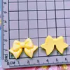 Dibujo animado color brillante con lazo de lunares pajarita pasador diadema pinza para el pelo pegamento de crema hebilla de zapato DIY accesorios de resina