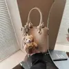 Bolso de hombro cruzado versátil de alta costura transfronterizo para mujer, nuevo y elegante 2026, bolso cruzado simple, bolso tipo cubo casual