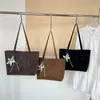 Otoño/Invierno 2026 Nuevo Bolso Tote de Alta Calidad con Textura Elegante de Nicho Gran Capacidad Moderno Simple Versátil de Hombro o de Mano