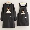 Delantal elegante, ultrafino y transpirable de manga larga, impermeable y resistente a las manchas, diseñado para uso en catering, adecuado para mujeres, para uso en la cocina en casa, y se puede usar como prenda exterior