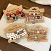 Nuevo conjunto de pulseras elásticas de mariposa con cuentas de cerámica acrílica estilo europeo y americano, pulsera de estilo étnico vintage, pulsera de nicho