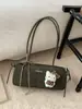 Bolsa de Axila Fashion Retrô para Mulheres 2026 Nova Tendência de Inverno Exquisite Versátil Bolsa Baguete Bolsa de Mão Bolsa de Ombro Atacado