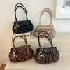 Bolso de lunares de moda transfronterizo, nueva colección de otoño 2026, bolso de mano exquisito, bolso para el trabajo, bolso de hombro con lazo y bolso de axila