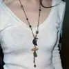 Colar de Metal Retro Laço Antigo Estilo Étnico Boêmio Simples Versátil Longo Pingente de Argola 2025