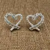 Nuevos Pendientes de Aguja de Plata Estilo Chica Francesa Pendientes de Encaje Estéreo Elegantes Diseño Simple de Corazón Femenino 2025