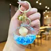 Llavero Creativo Serie Océano Relleno de Aceite Pez Payaso Estrella de Mar Pez Pequeño Colgante de Bolso Decoración de Llavero