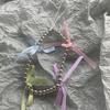 Cordón para teléfono móvil con lazo de perlas de lujo, estilo coreano, hecho a mano, con cuentas que combinan con todo, adornos colgantes para bolso, corazón colorido para niña