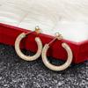 Cao Shi estilo francés elegante alto sentido arete diamante completo Super Flash aretes de cobre vintage metal moderno joyería de oreja personalizada